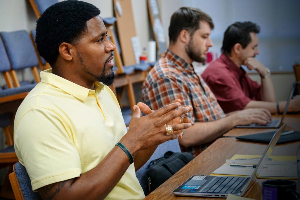 Victor Ellison preaching in class