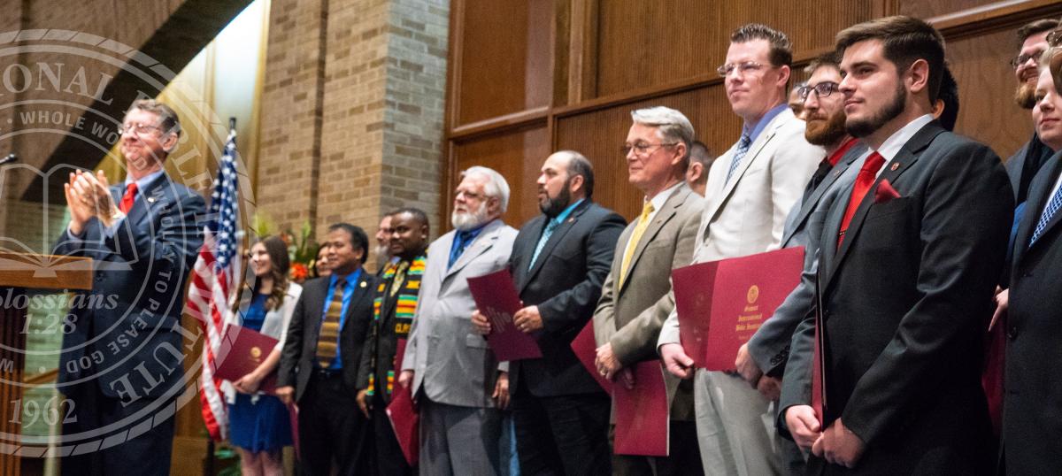 Graduates Recieving their Bachelor Degrees