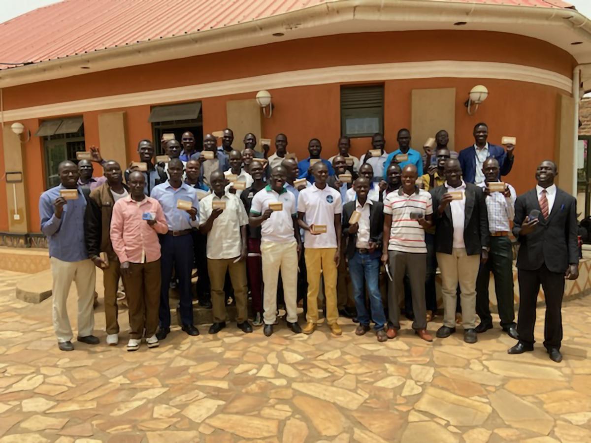 Sudanese preachers with their solar players