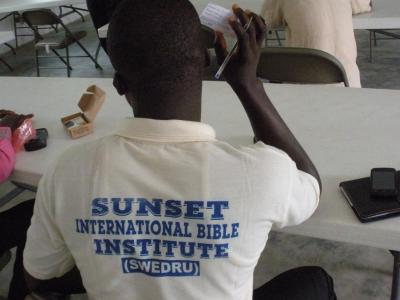 A student from the school in Swedru, Ghana receives his player.