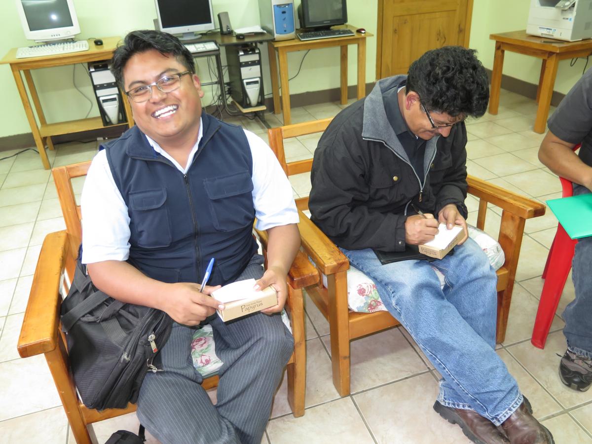 A preacher in Ecuador receiving his solar player